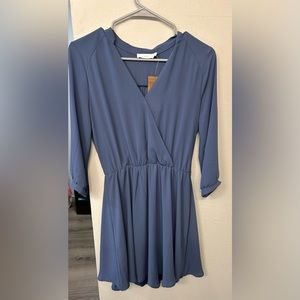 3/4 sleeve, mid length dress (slightly above the knee)